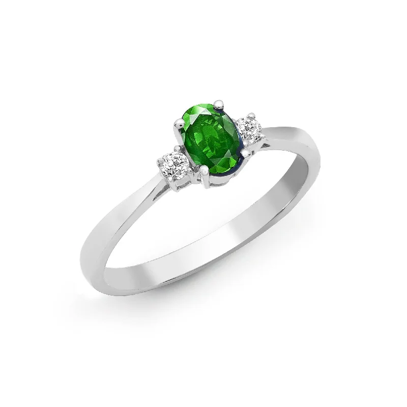 Octagonal shape rings-18ct White Gold Diamond And Emerald And 3 Stone Ring