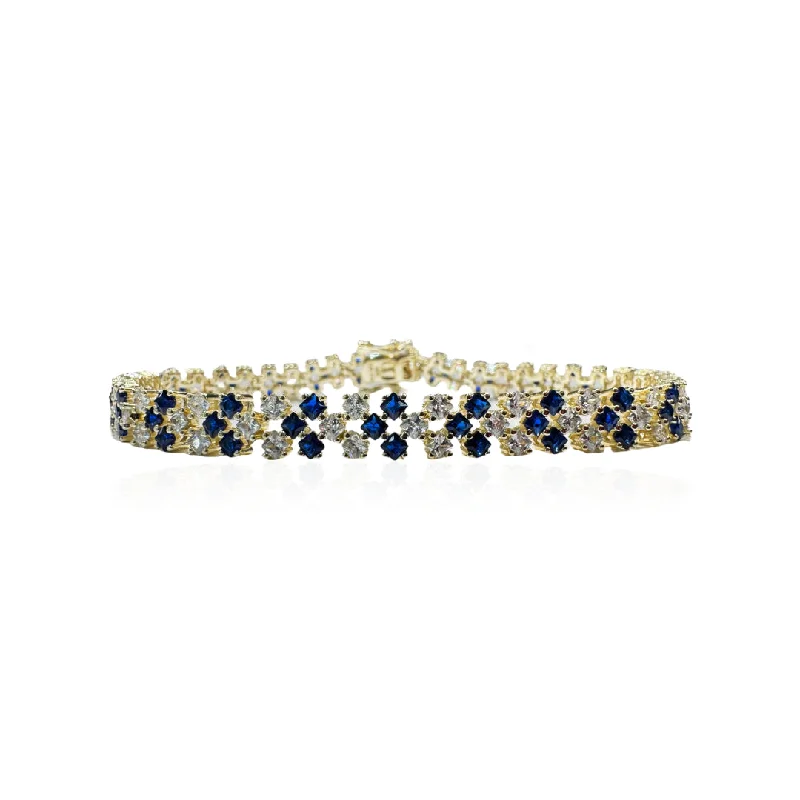 Vibrant enamel bracelets-Gold Plated Scattered Tennis Bracelet With Sapphire CZs And White CZs