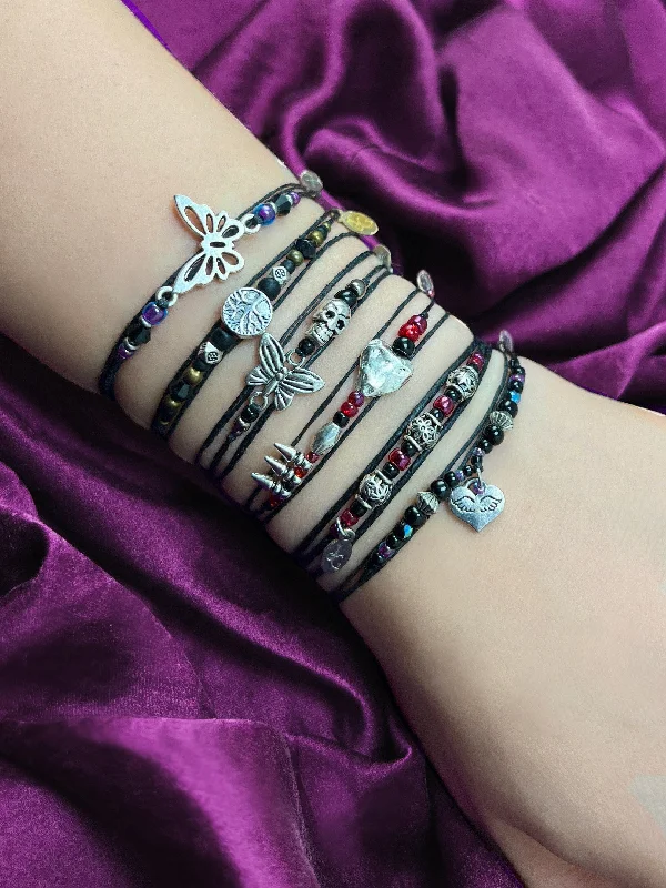 Glossy black bracelets-6 Piece NTIO Bracelet Bundle by Johnnie Guilbert