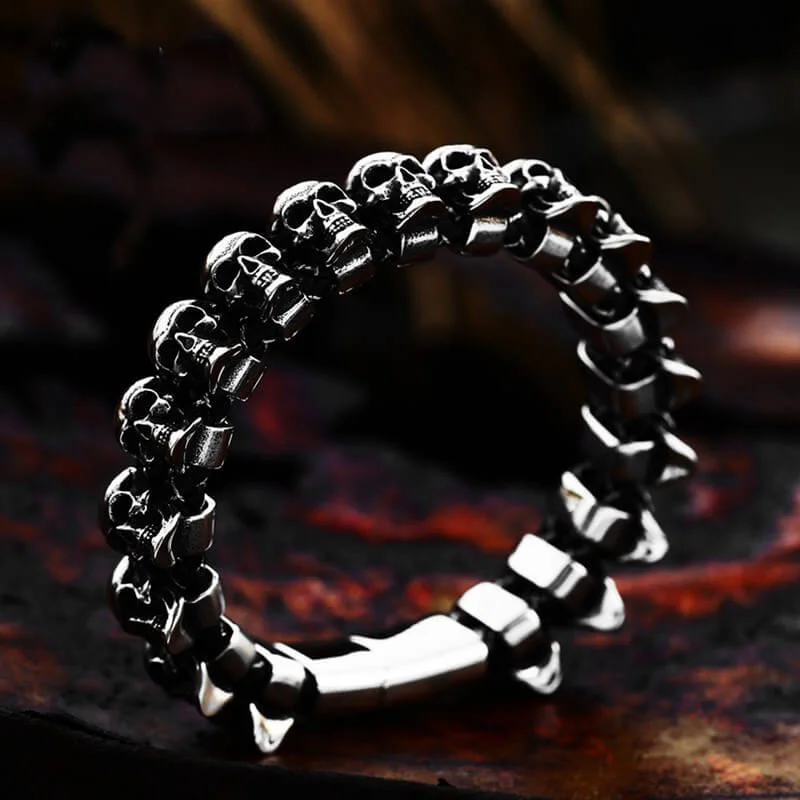 Wicker weave bangles-Surrounded Skulls Stainless Steel Bracelet